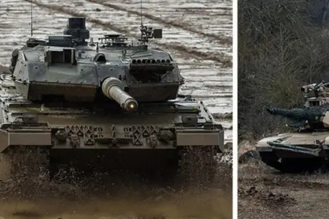 Leopard 2 kämpft sich durch Schlamm, während ein M1 Abrams im Wald lauert.