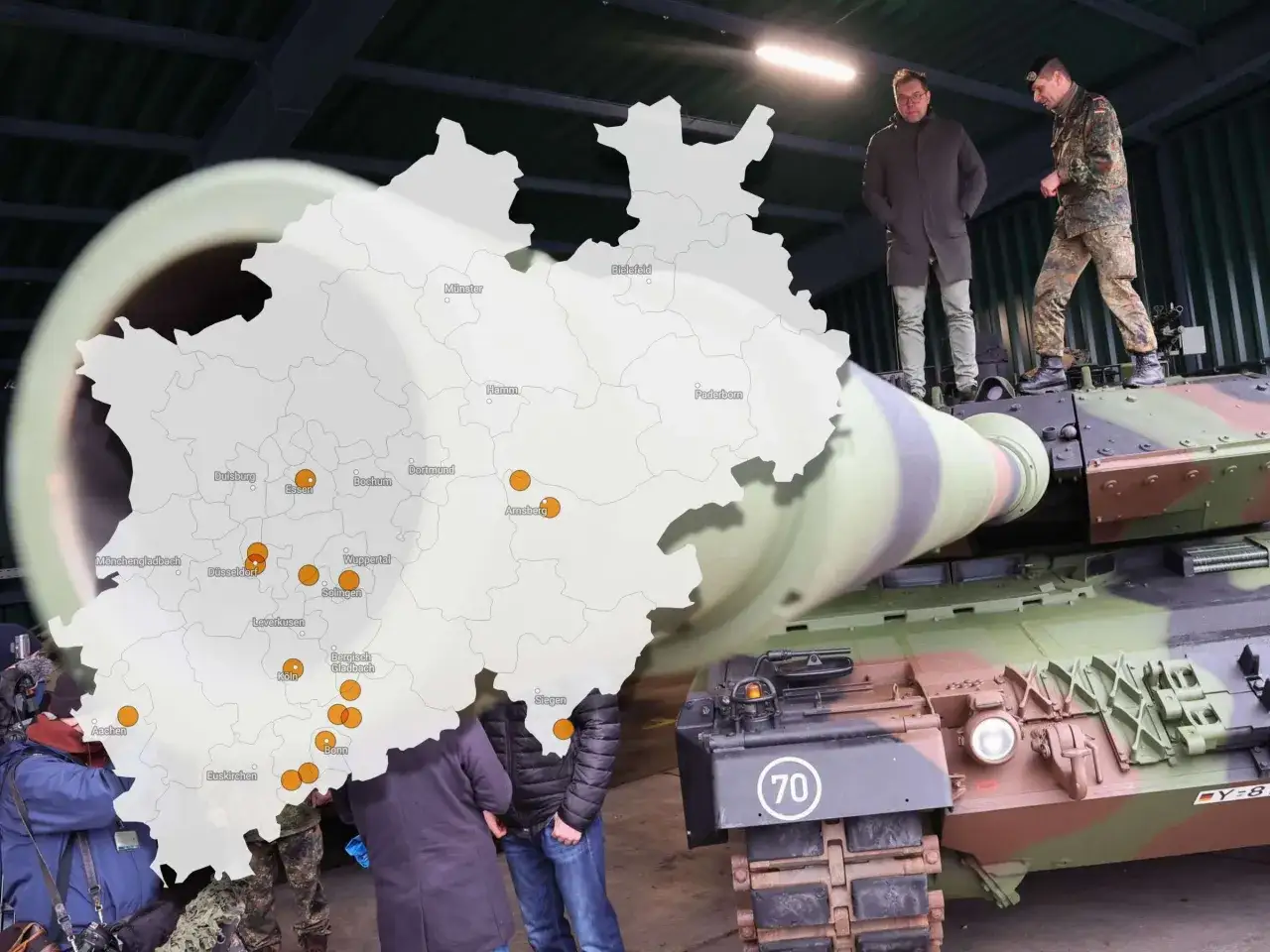 Wo werden in Deutschland Panzer gebaut? Eine Karte zeigt Standorte in Nordrhein-Westfalen, während ein Leopard 2 Panzer zu sehen ist.