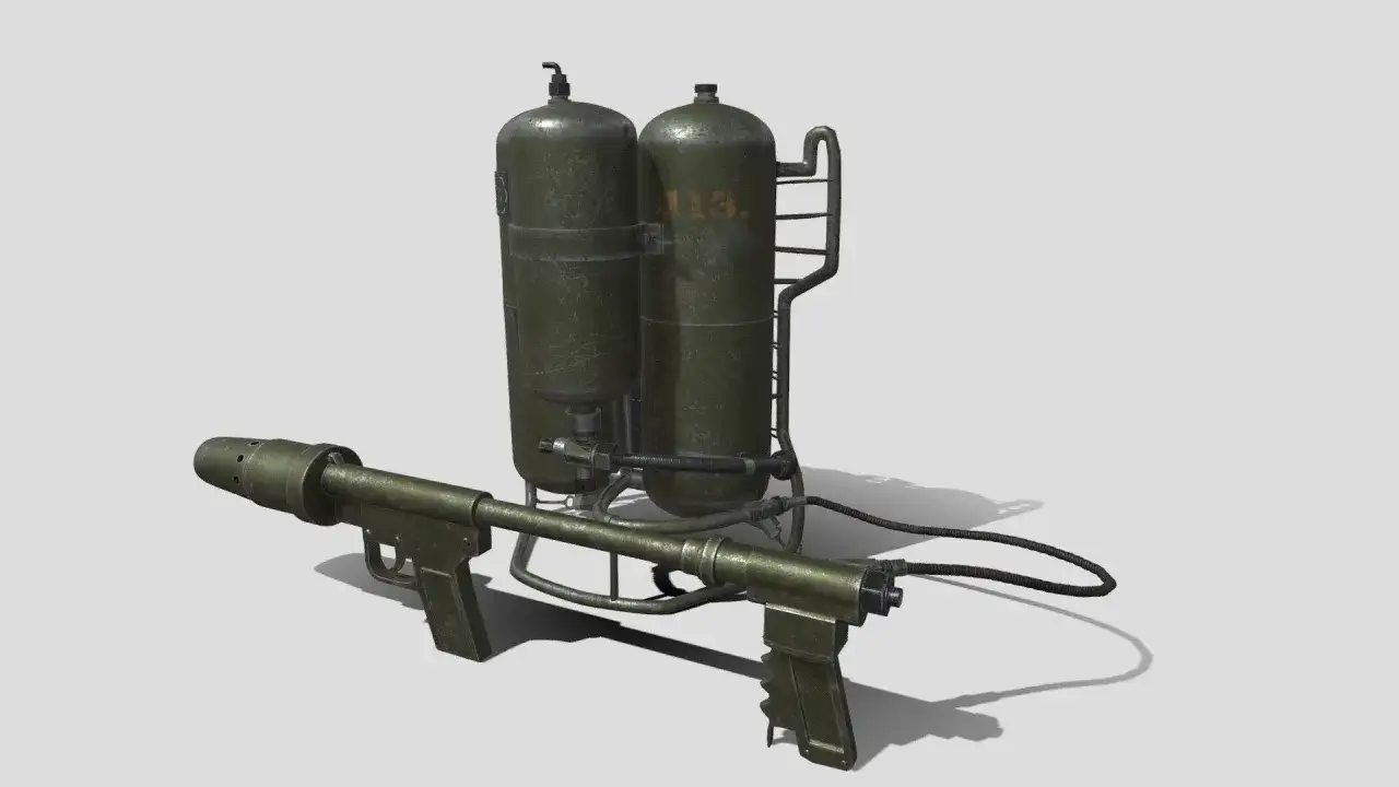 Ein Flammenwerfer aus dem 2. Weltkrieg, mit zwei gr&uuml;nen Tanks und einem langen Rohr mit Griffen.